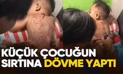 Küçük çocuğun sırtına dövme yapıldığı görüntüler sosyal medyada infial yarattı!