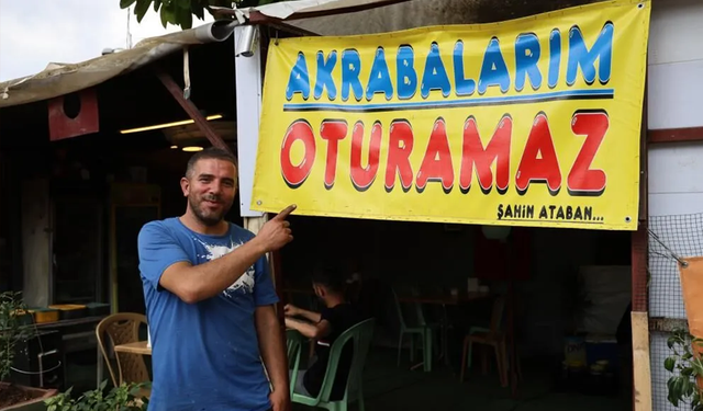 Adana’da bir kişi iş yerine, ‘Akrabalarım oturamaz’ afişi astı